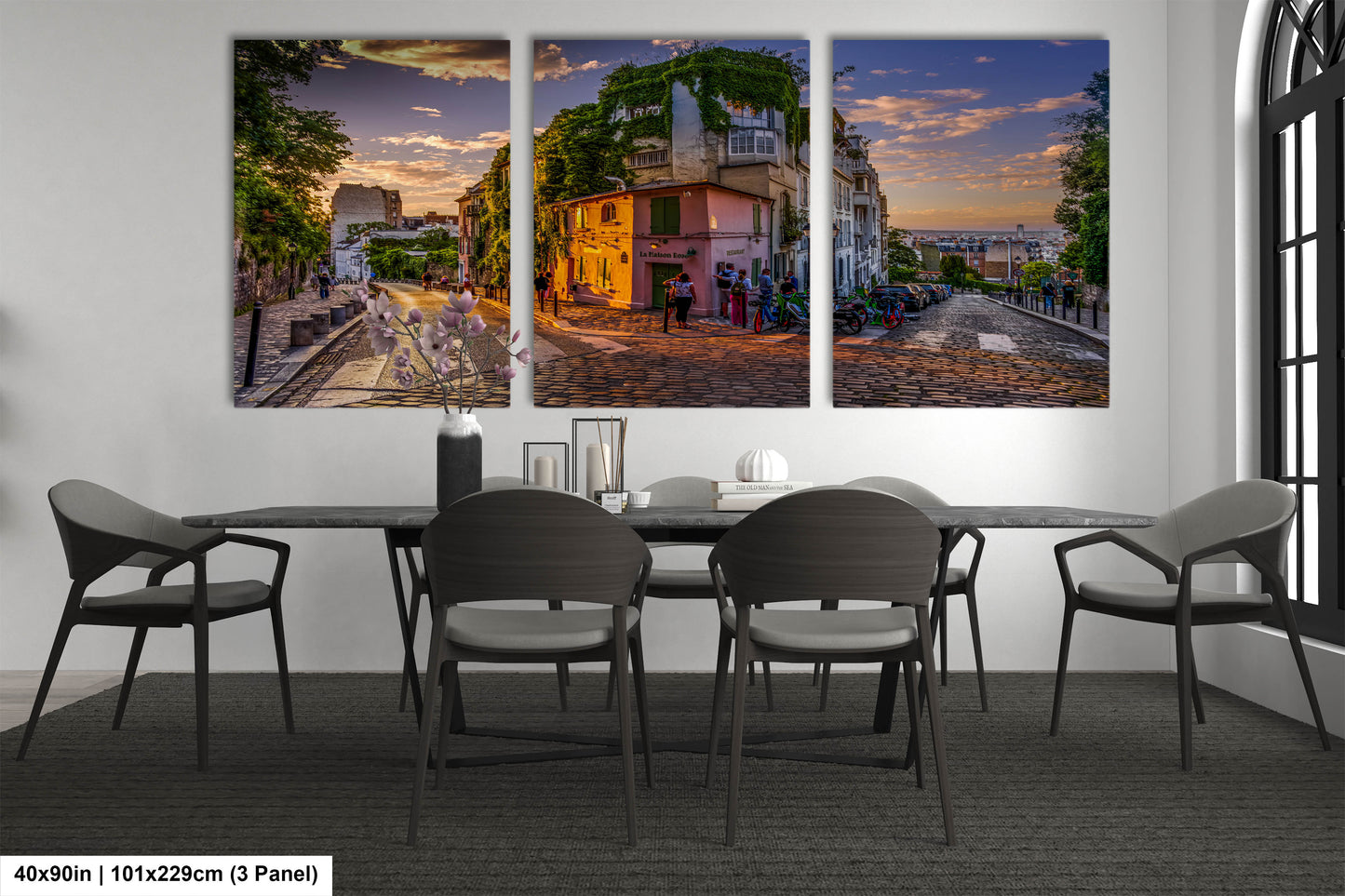 a dining room with a table and chairs