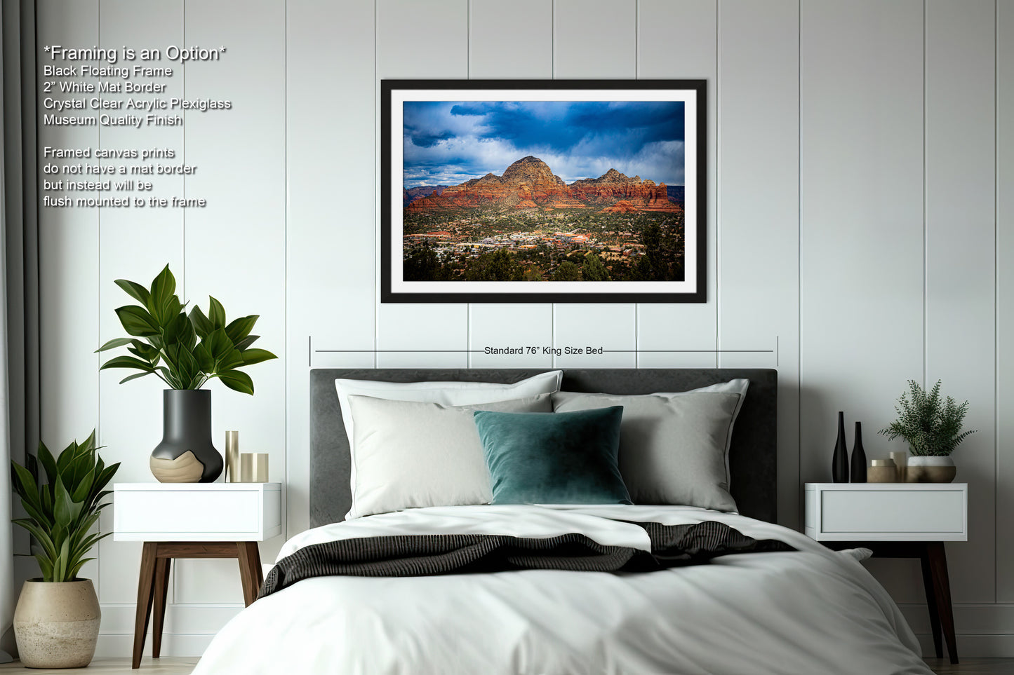 a bedroom with a bed and a picture on the wall
