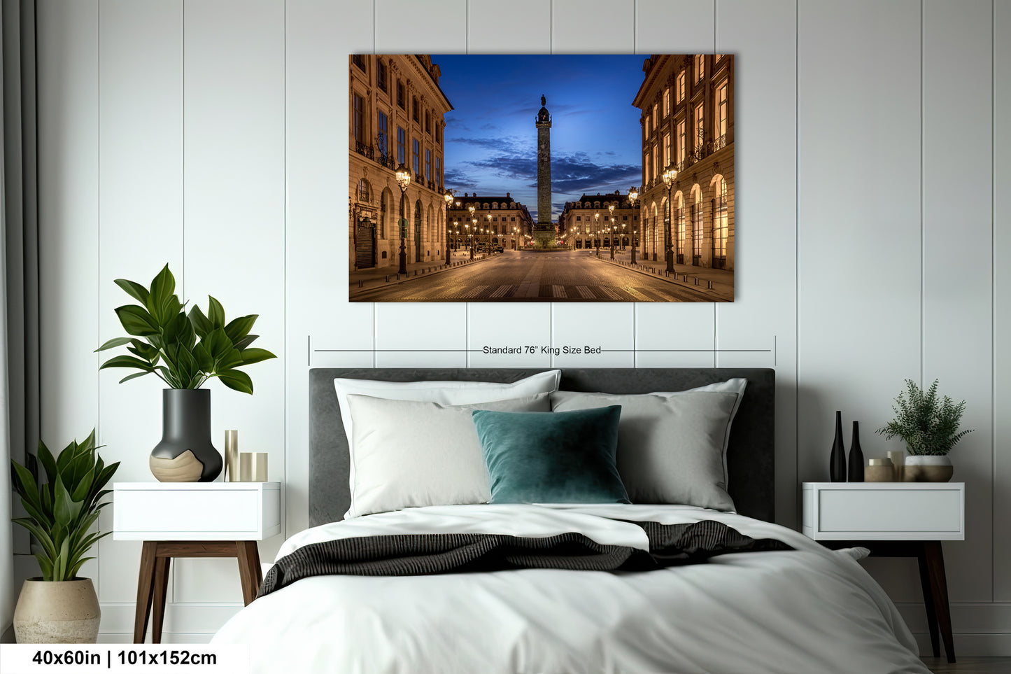 a bedroom with a large bed and a painting on the wall