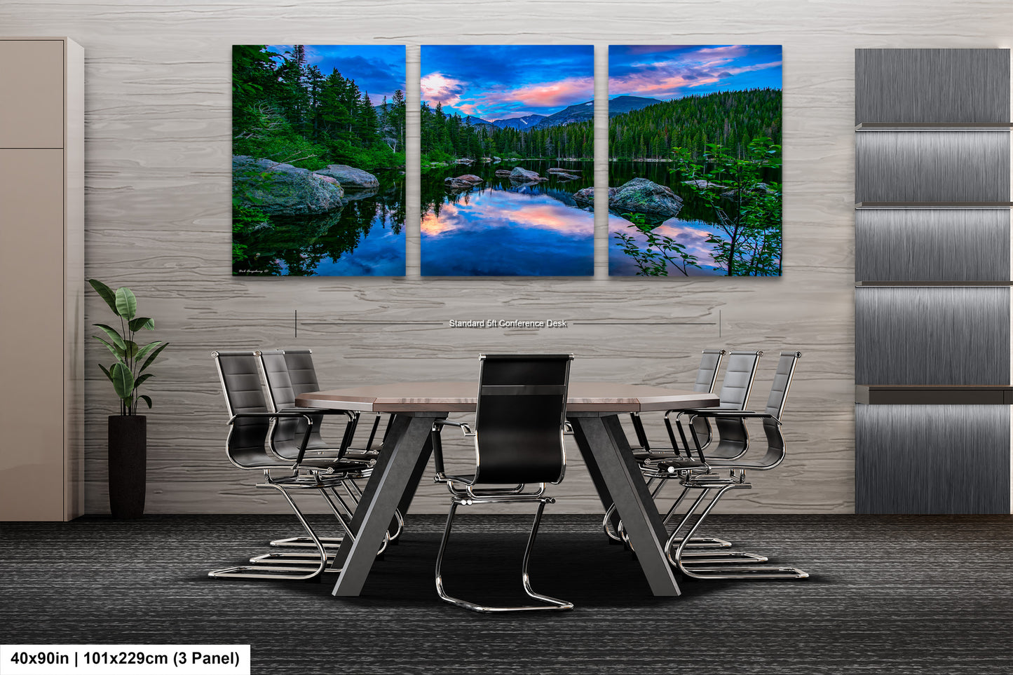 a dining room table with chairs and a painting on the wall