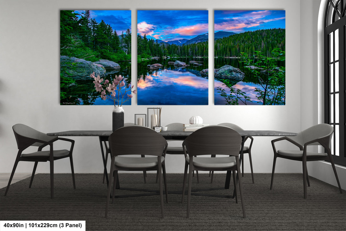 a dining room with a table and four chairs