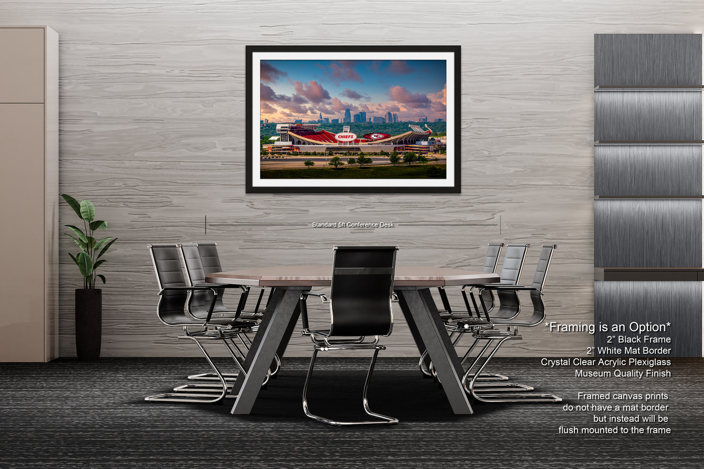 a dining room table with chairs and a picture hanging on the wall