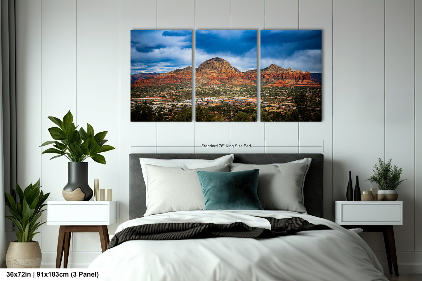 a bed room with a neatly made bed and a painting on the wall