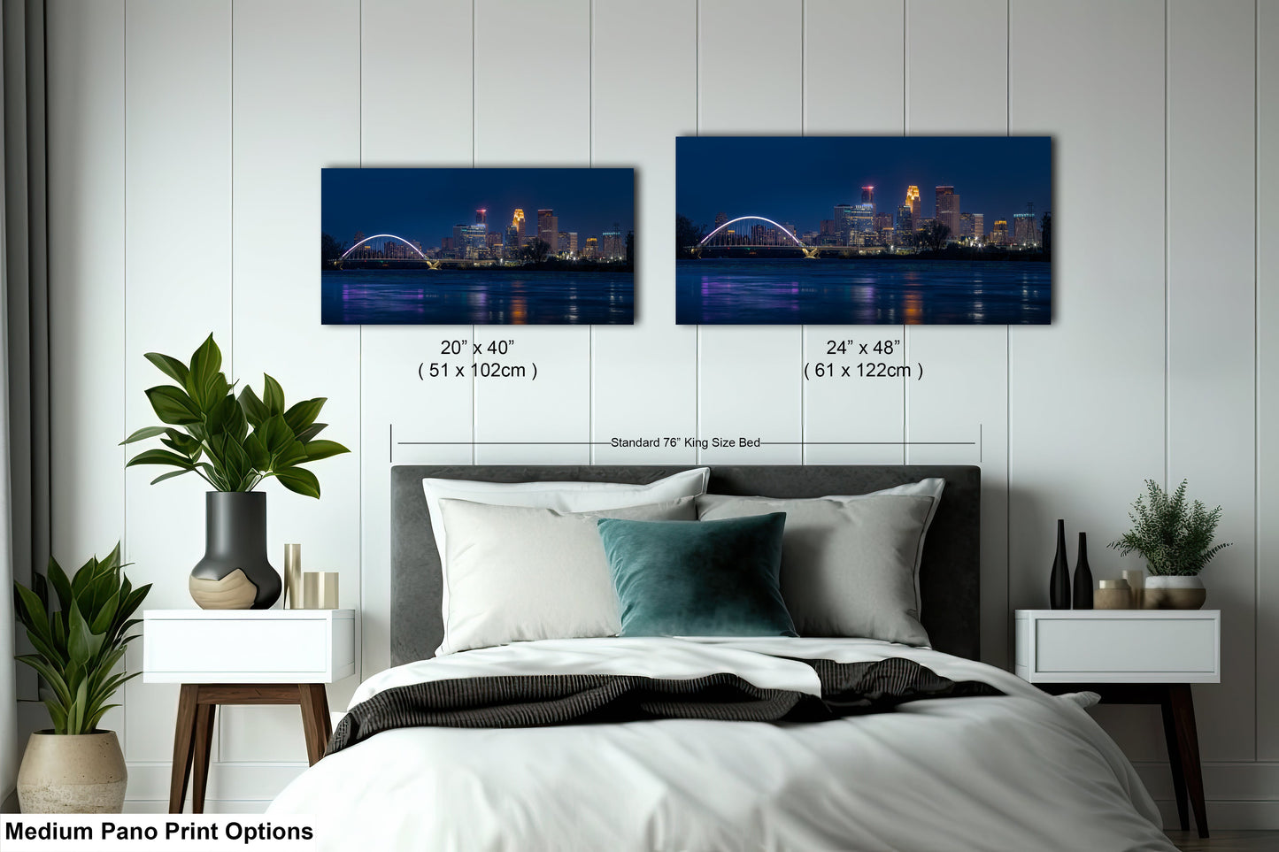 a bedroom with a bed and two pictures of the city