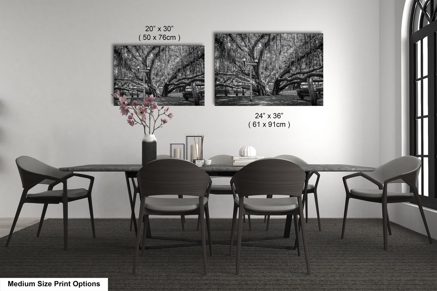 a black and white photo of a table and chairs