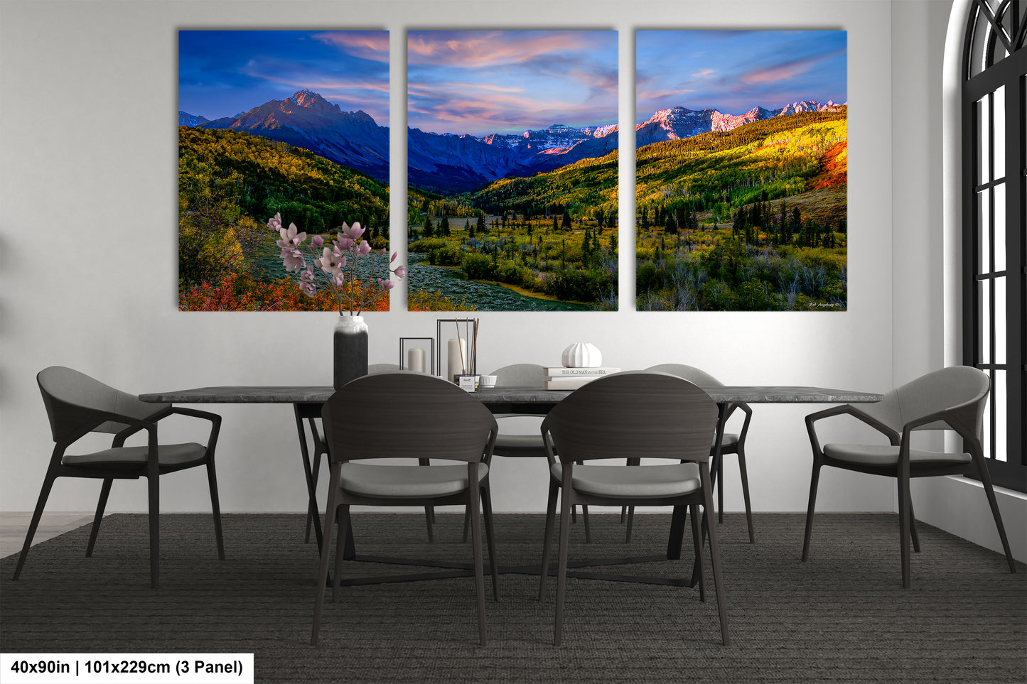 a dining room with a table and four chairs