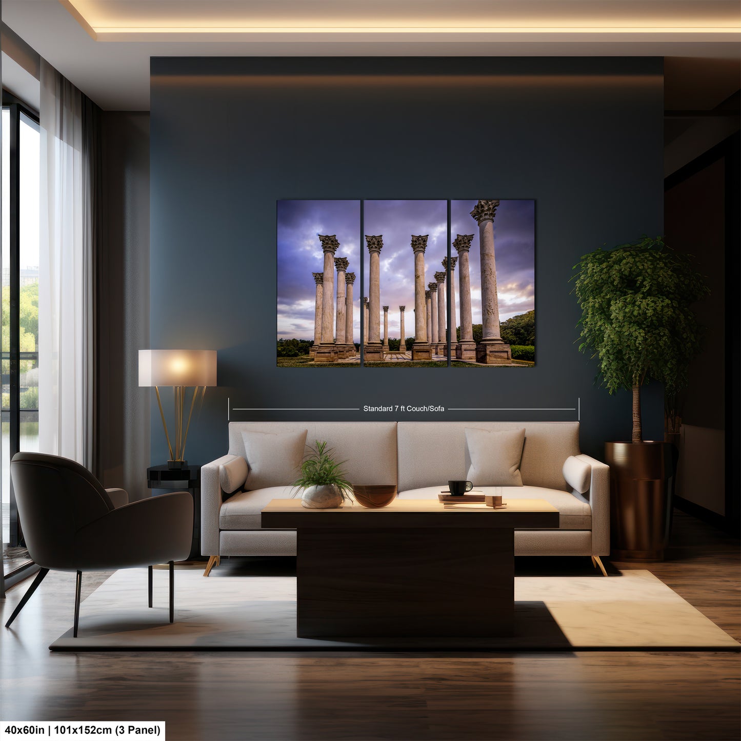 a living room with a couch a table and a painting on the wall