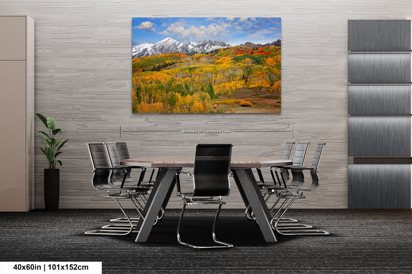 a dining room table with chairs and a painting on the wall