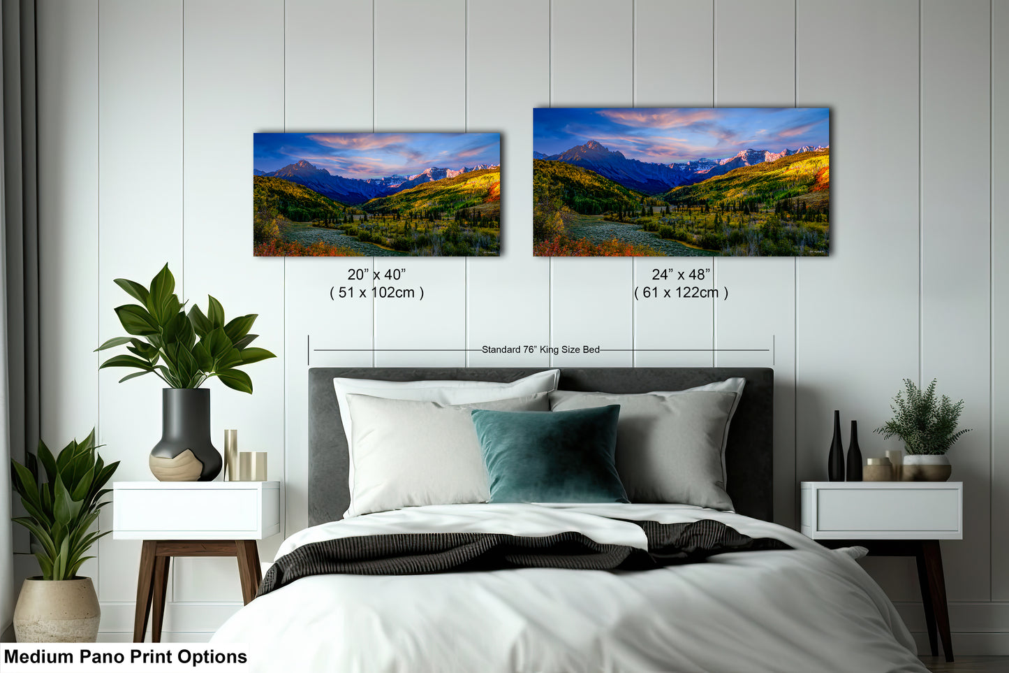 a bedroom with a bed and two pictures on the wall