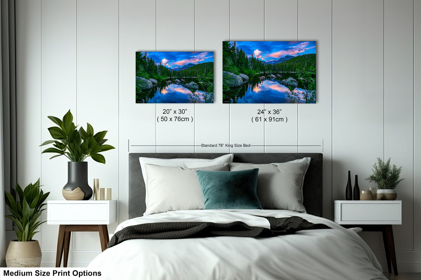 a bed room with a neatly made bed and two pictures on the wall