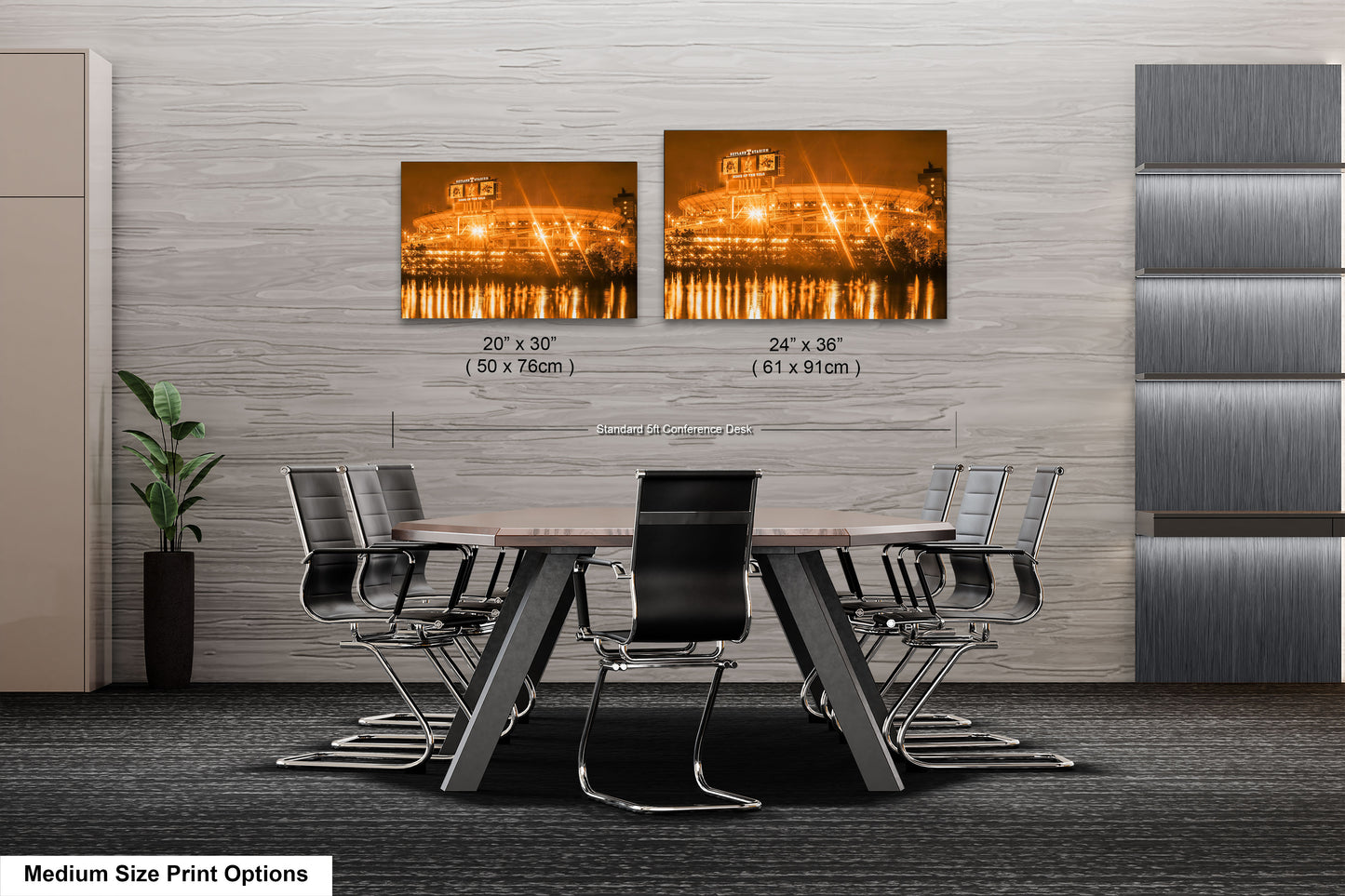 a dining room table with chairs and two pictures of a stadium