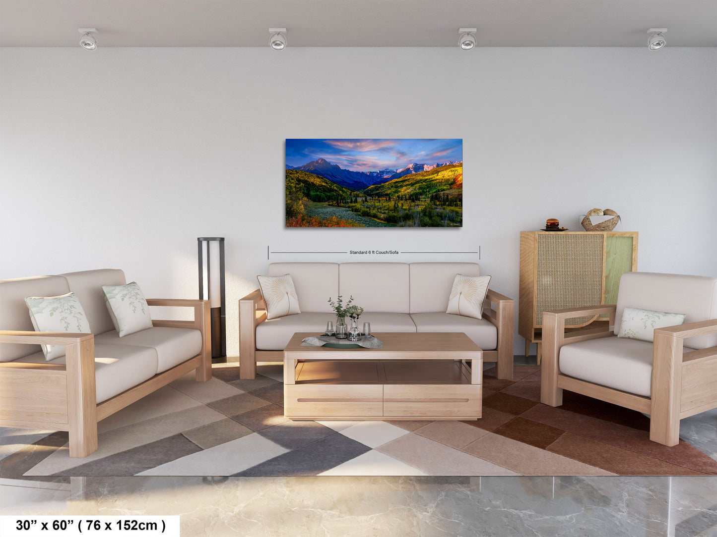 a living room filled with furniture and a painting on the wall