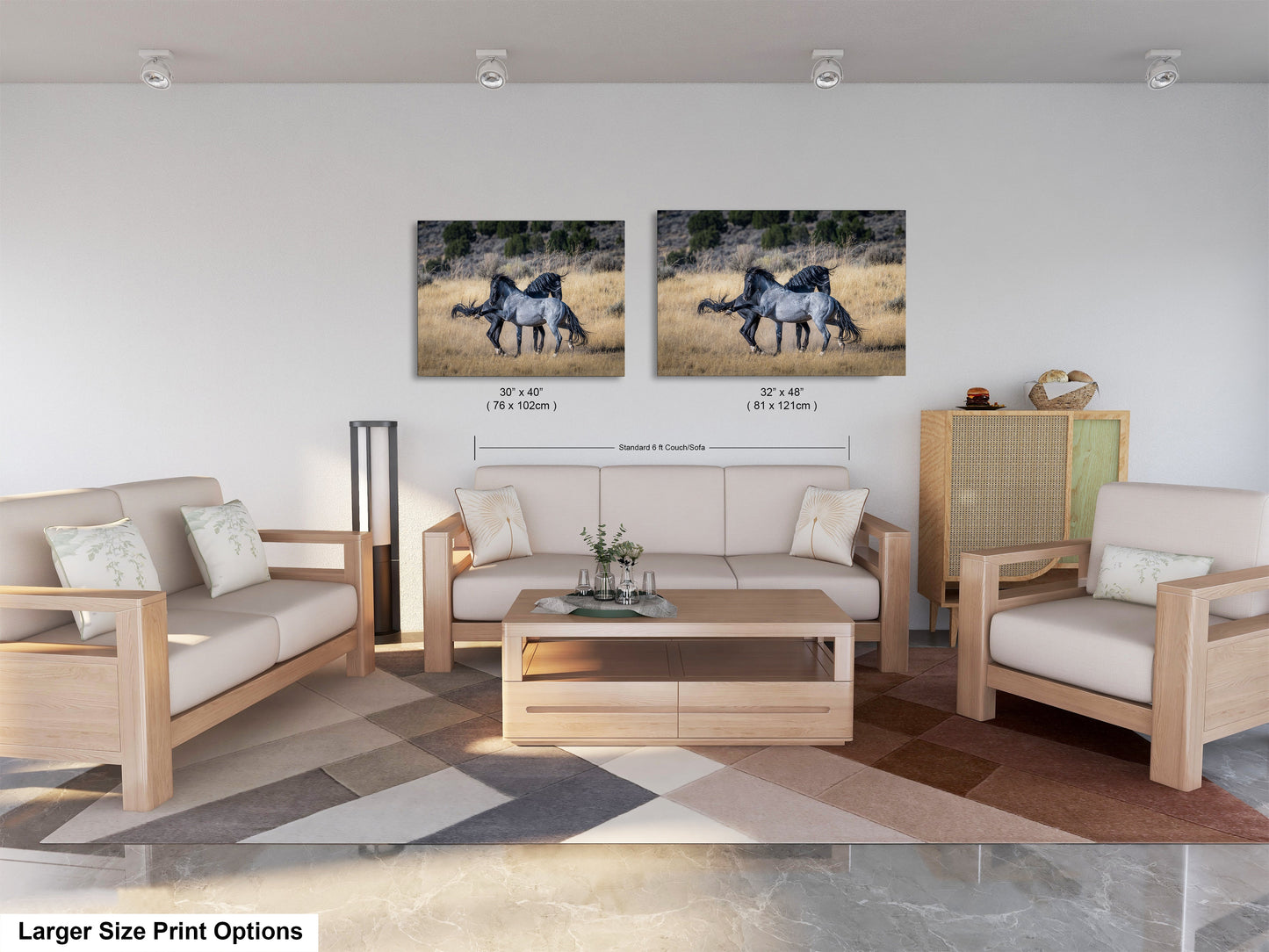 a living room with two pictures of horses on the wall