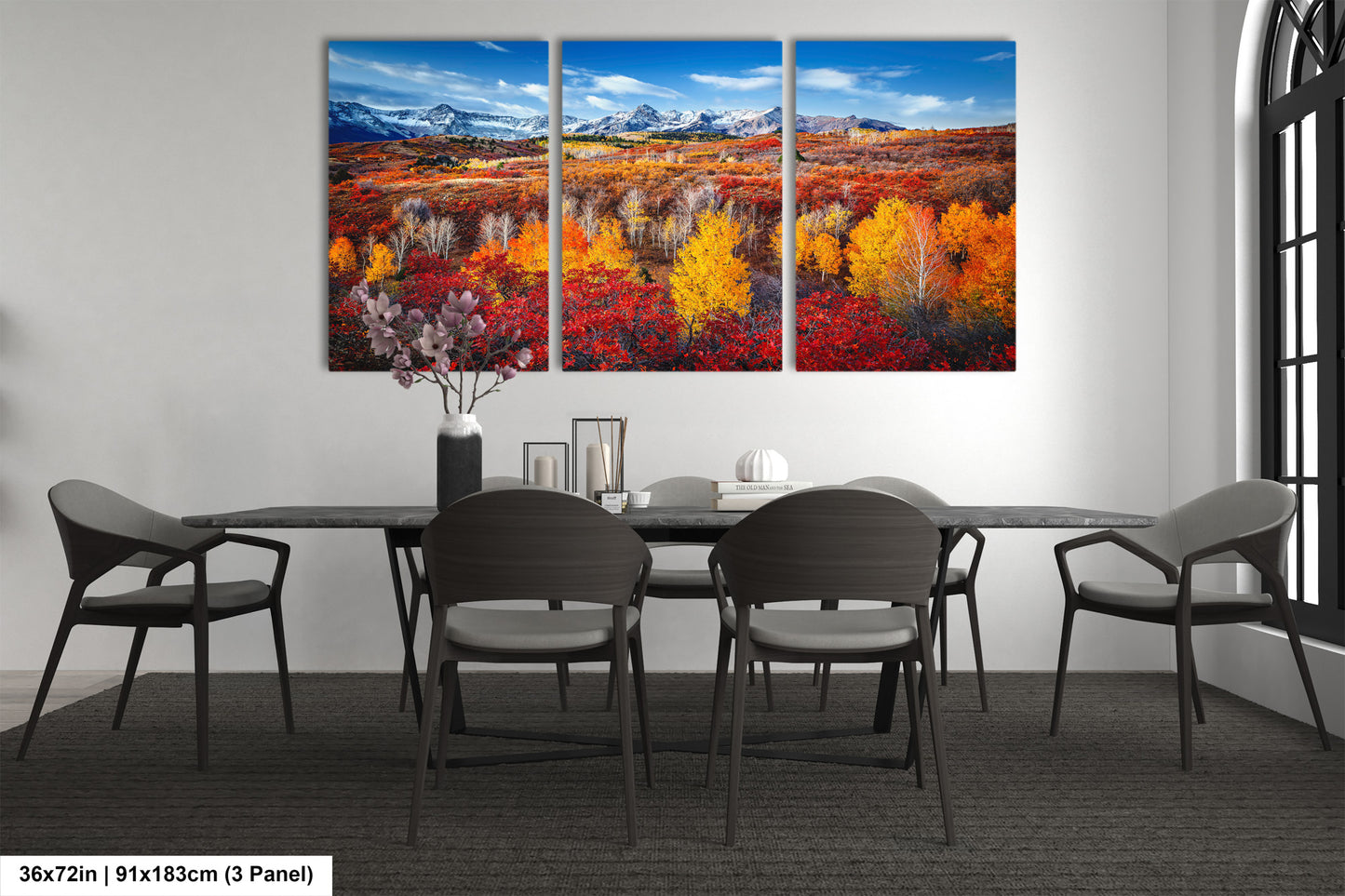 a dining room with a table and four chairs