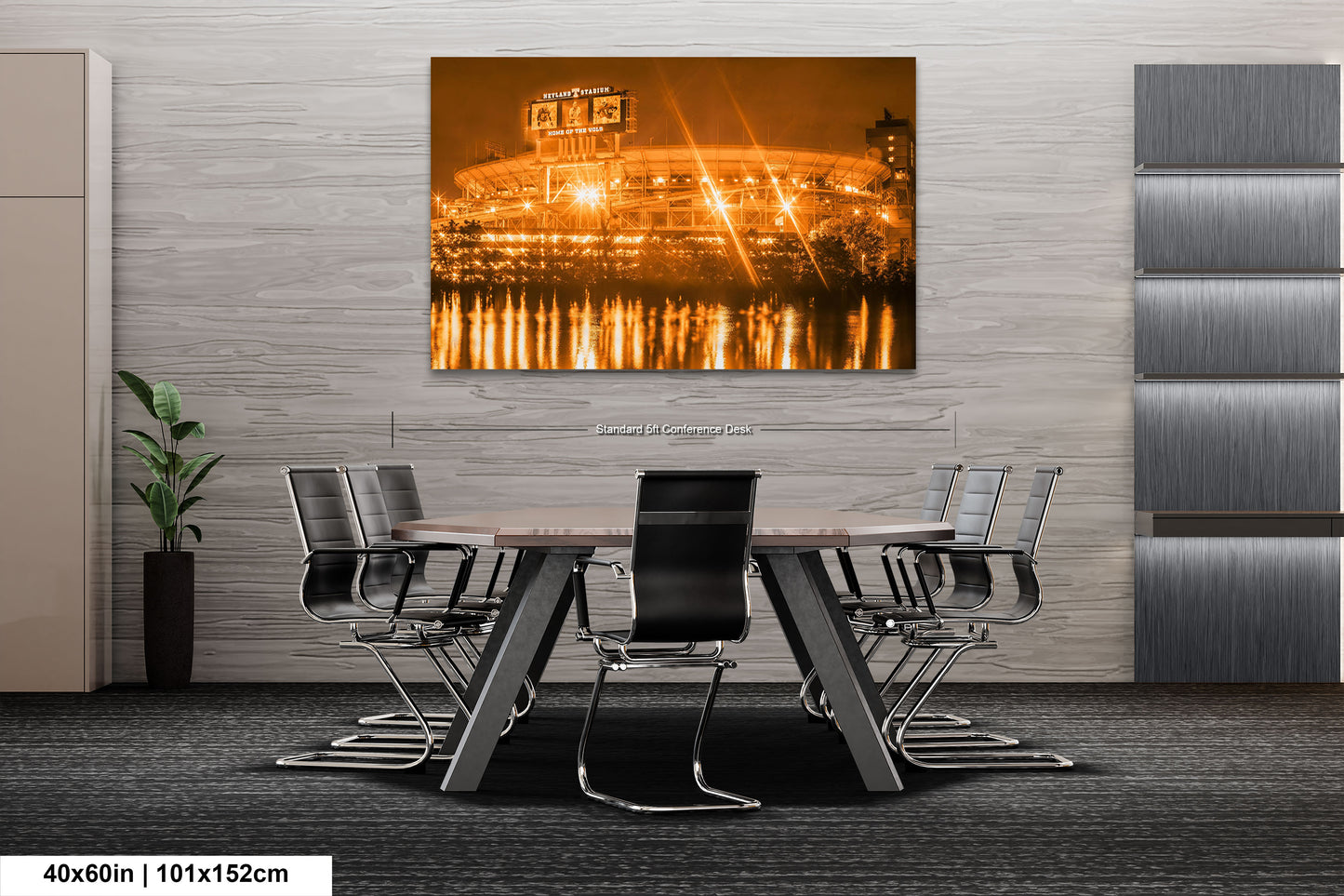 a dining room table with chairs and a picture of a stadium