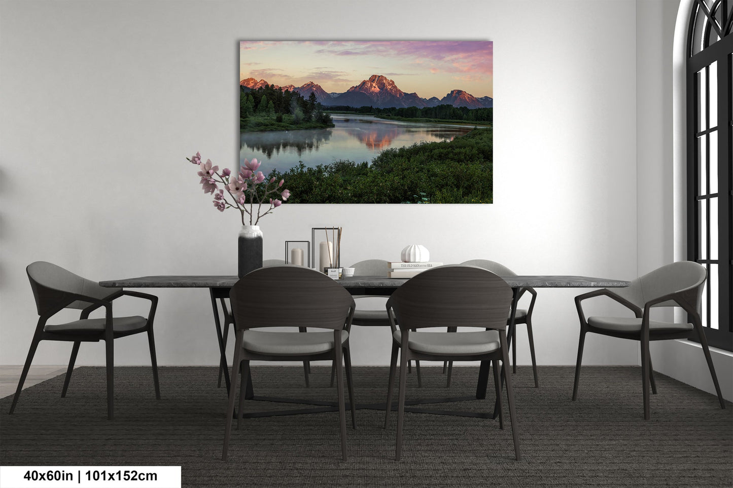 a dining room with a table and chairs