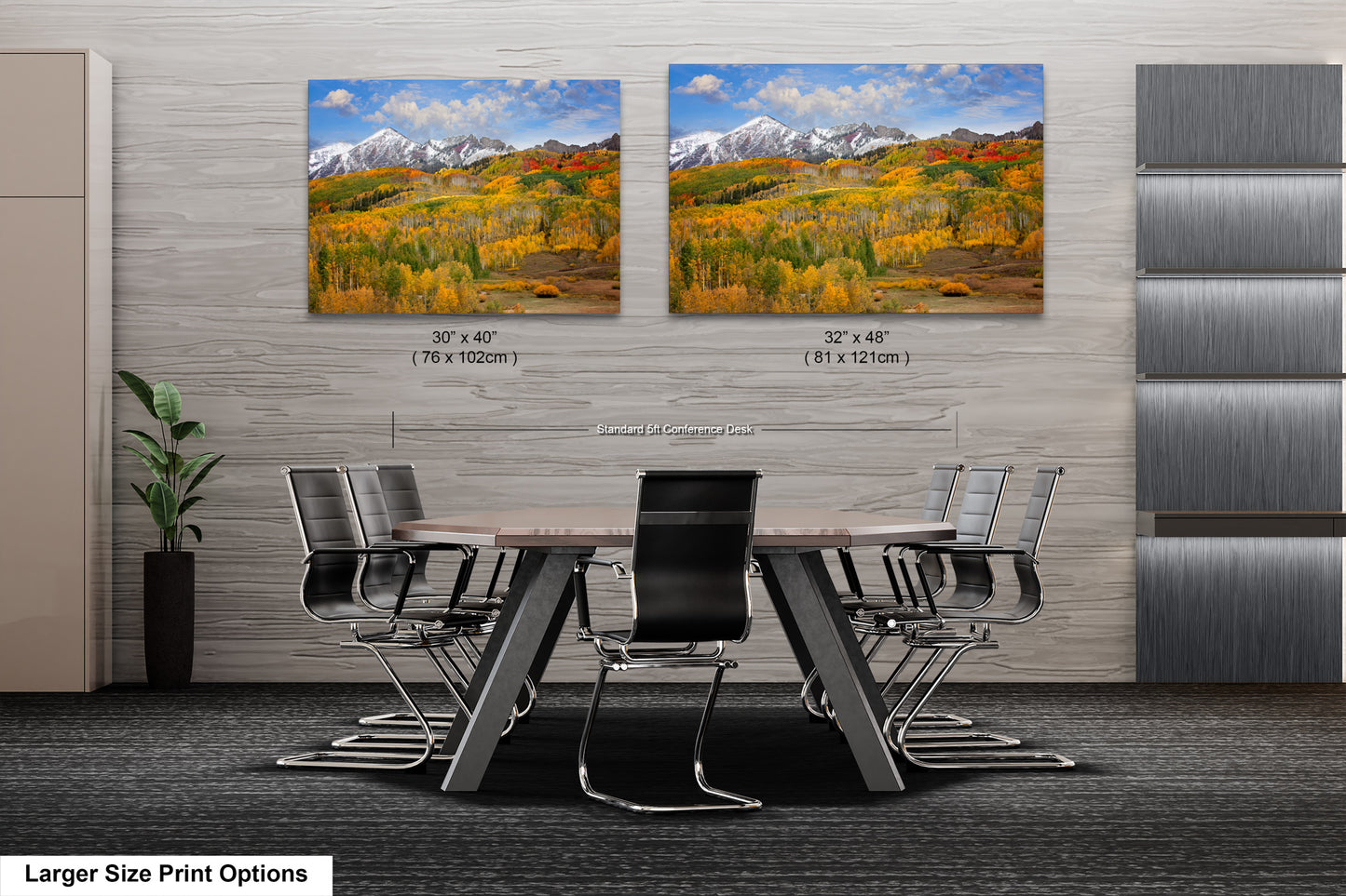 a dining room table with chairs and two pictures on the wall