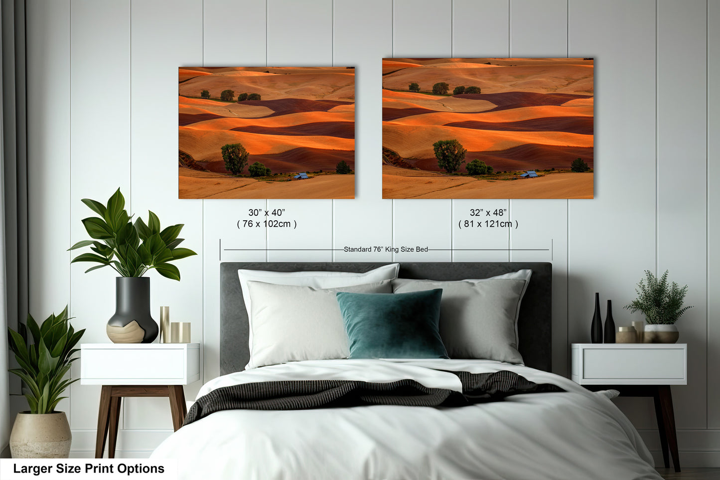 a bed room with two pictures on the wall