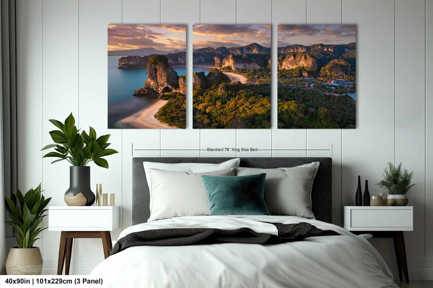a bedroom with a bed and two paintings on the wall
