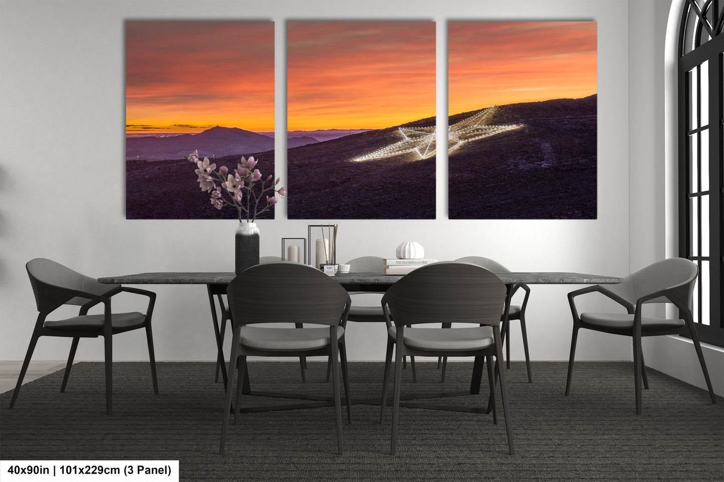 a dining room with a table and four chairs