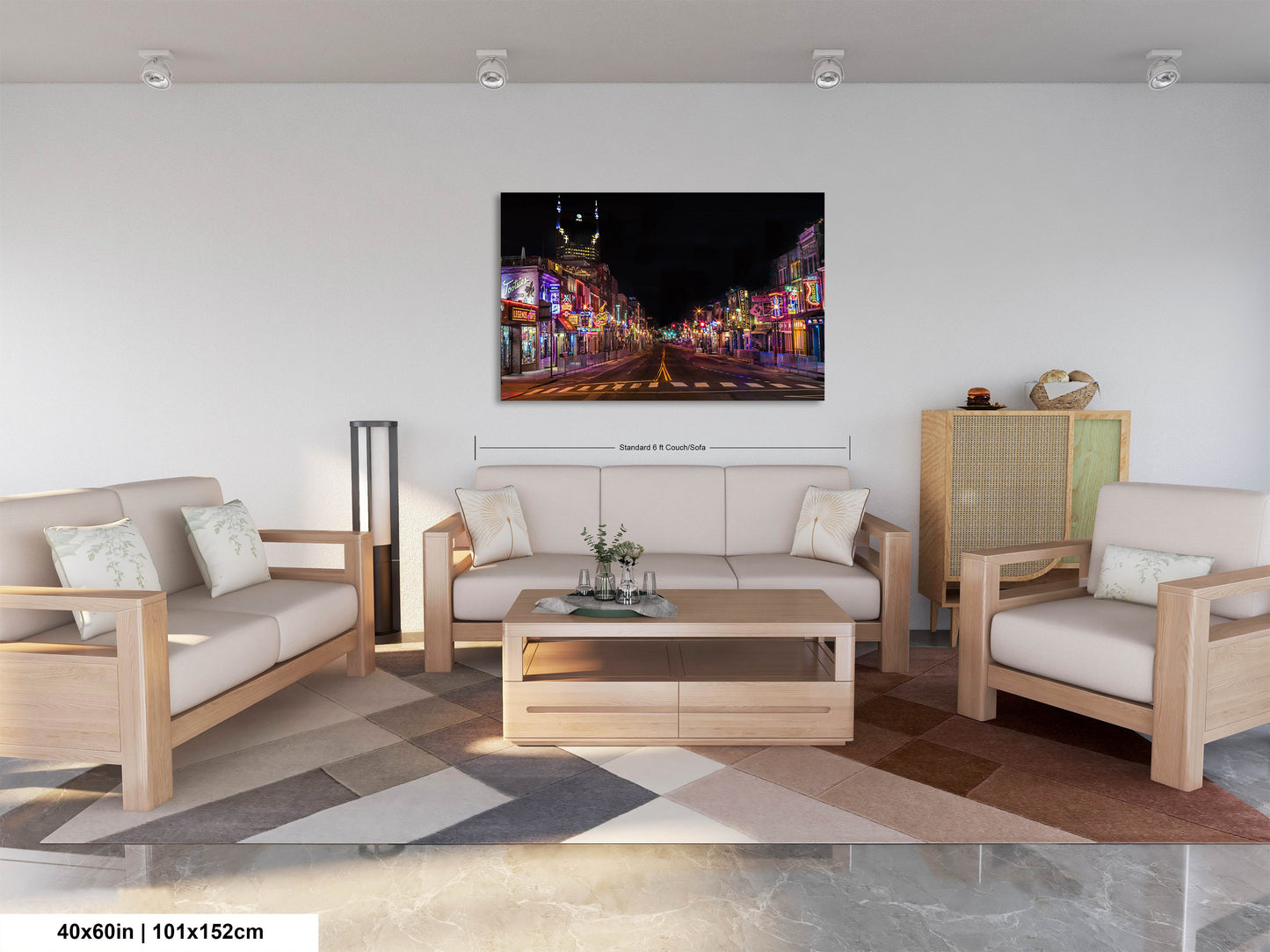 a living room filled with furniture and a painting on the wall