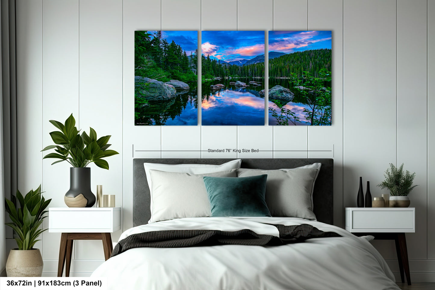 a bedroom with a bed and a painting on the wall