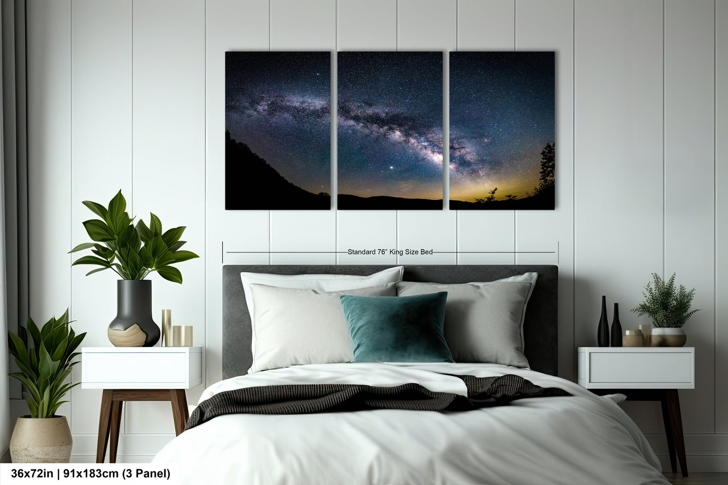 a bedroom with a bed and two paintings on the wall