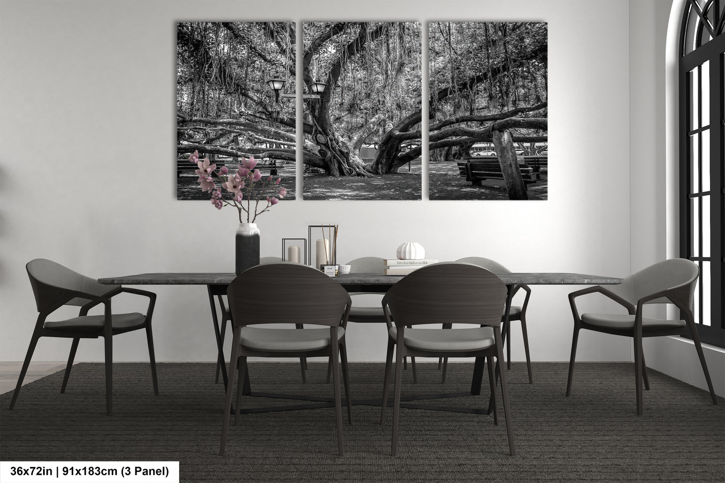 a black and white photo of a dining room table