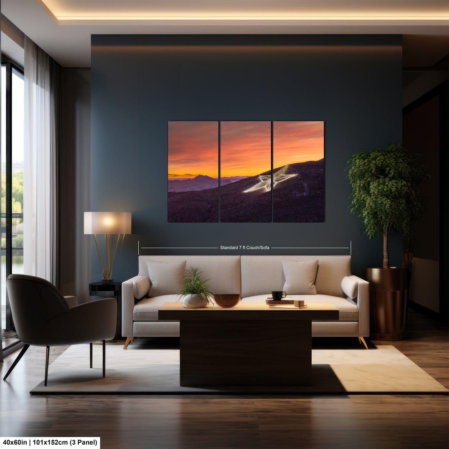 a living room with a couch a table and a painting on the wall