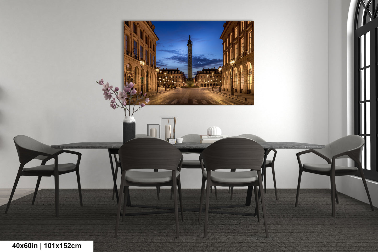 a dining room with a table and chairs