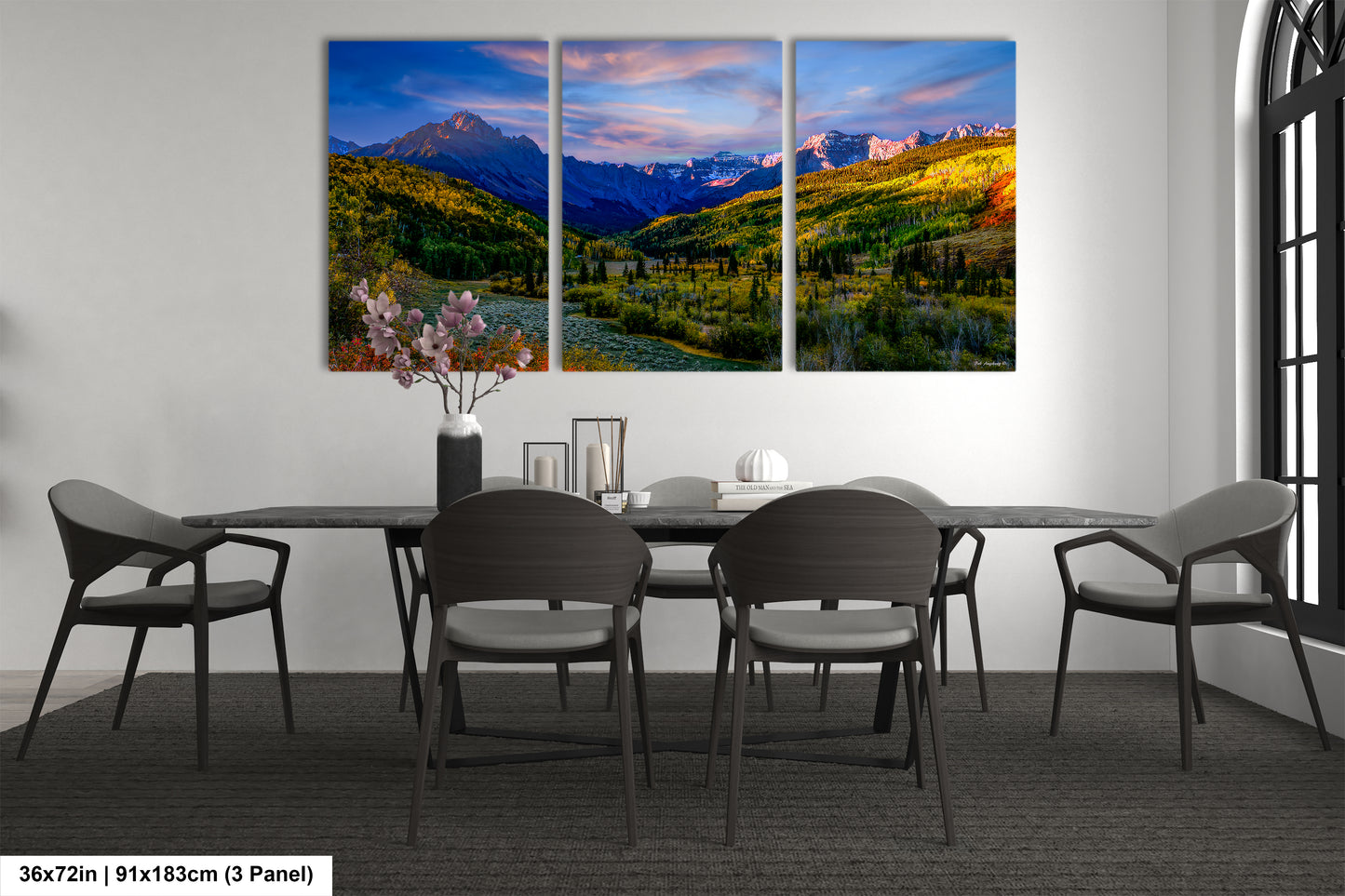a dining room with a table and four chairs