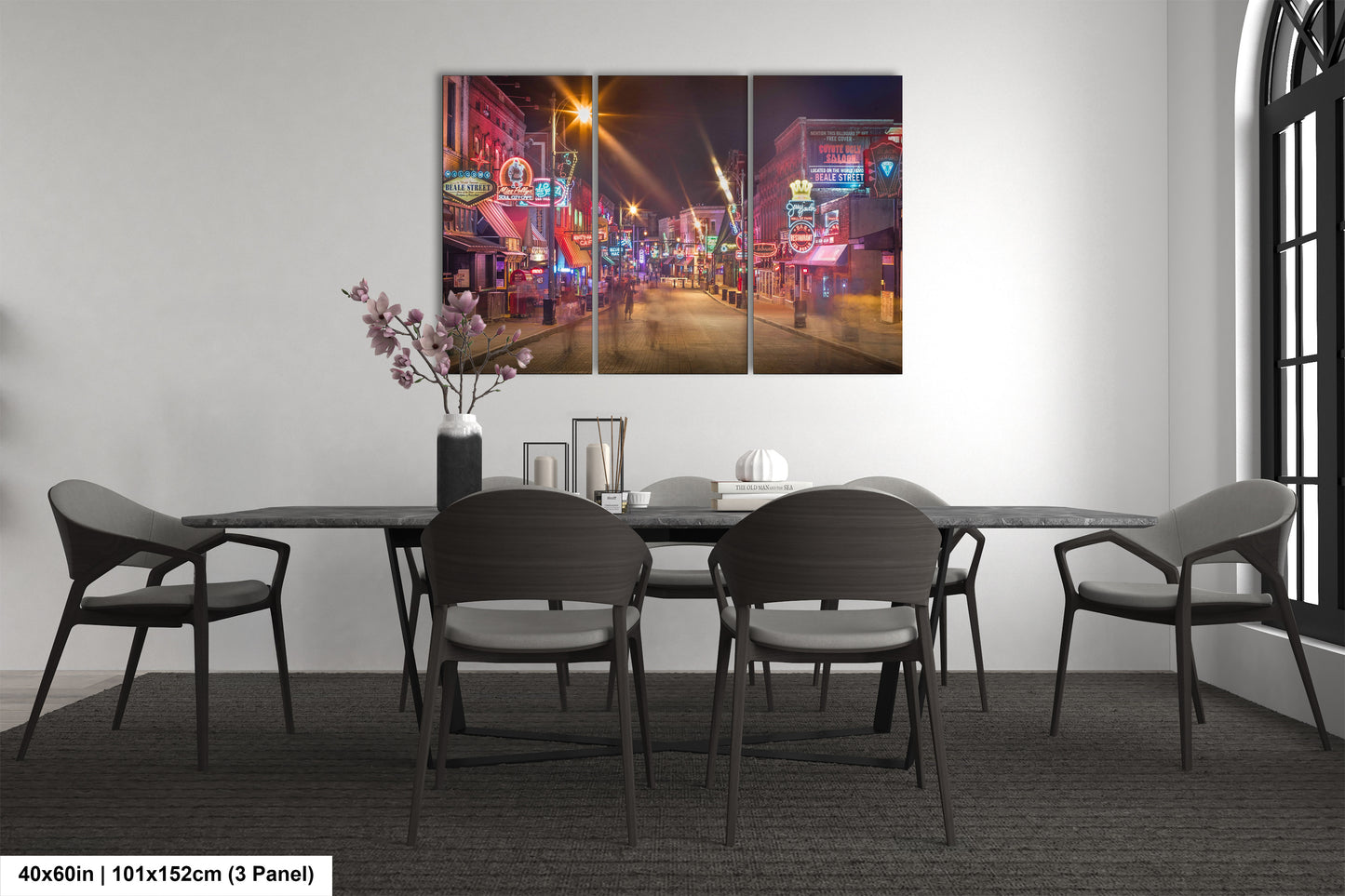 a dining room with a table and chairs