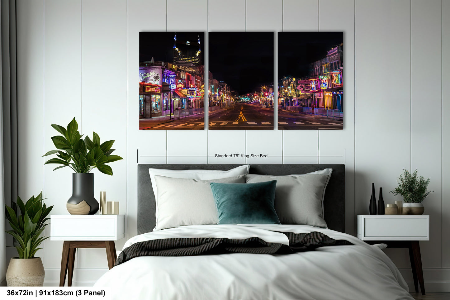 a bed room with a neatly made bed and two paintings on the wall