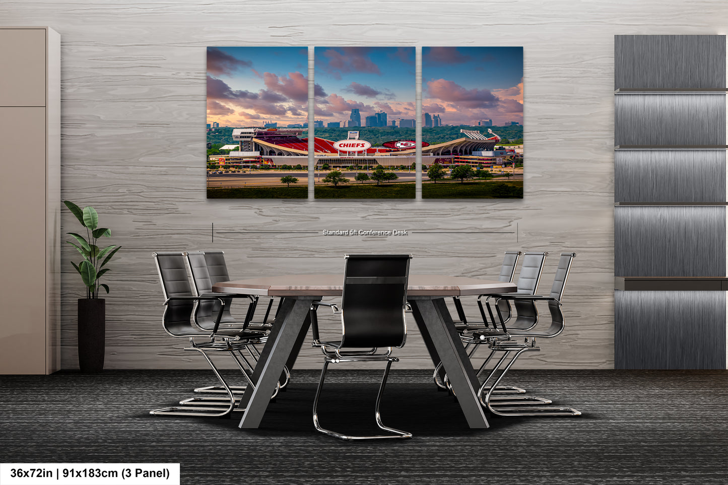 a dining room table with chairs in front of a wall with a picture of a