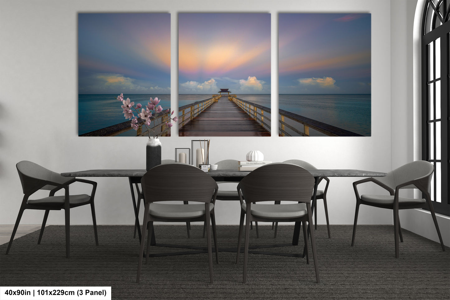 a dining room with a table and four chairs