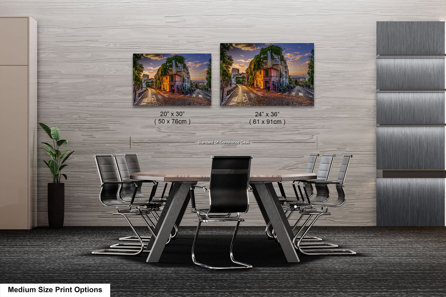 a dining room table with chairs and two pictures on the wall