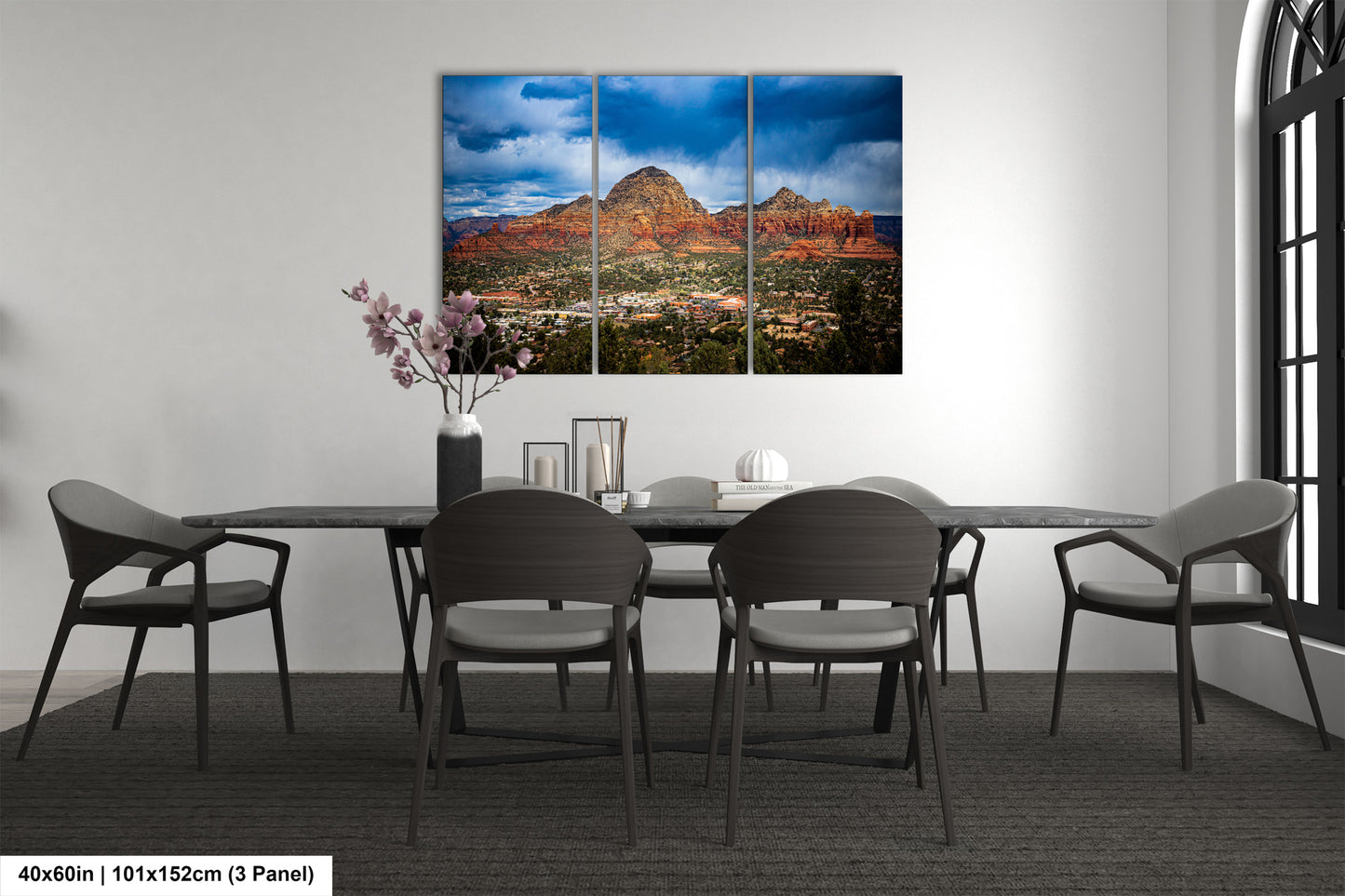 a dining room with a table and chairs