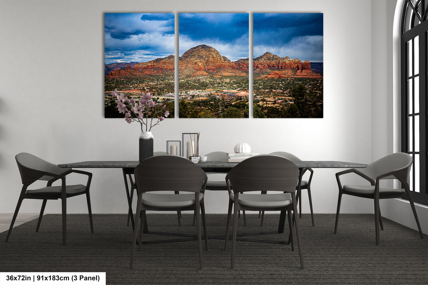 a dining room with a table and chairs
