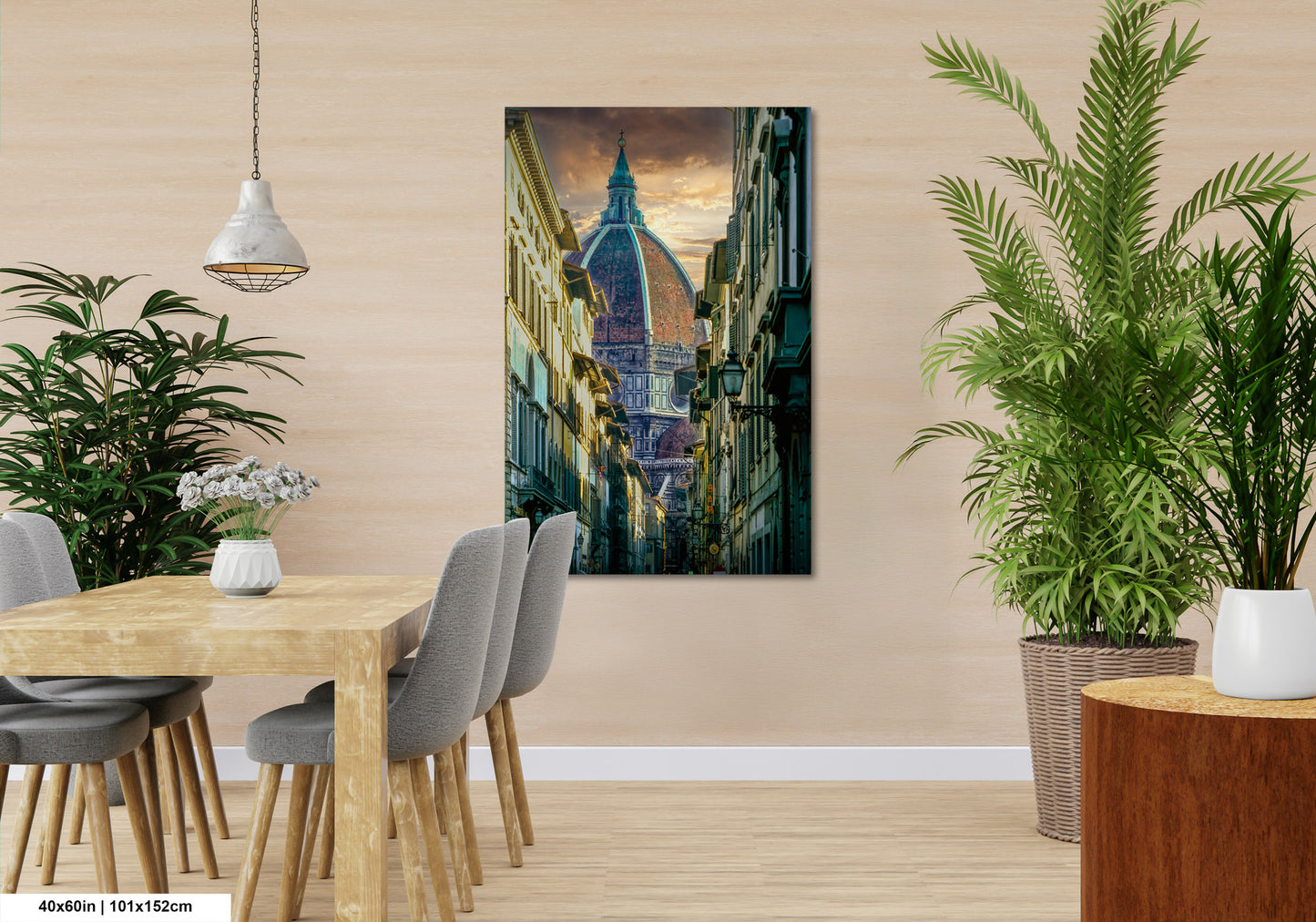 a room with a table and chairs and a painting on the wall