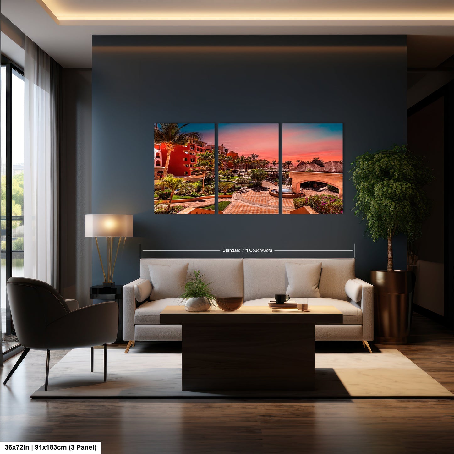 a living room with a couch and two paintings on the wall