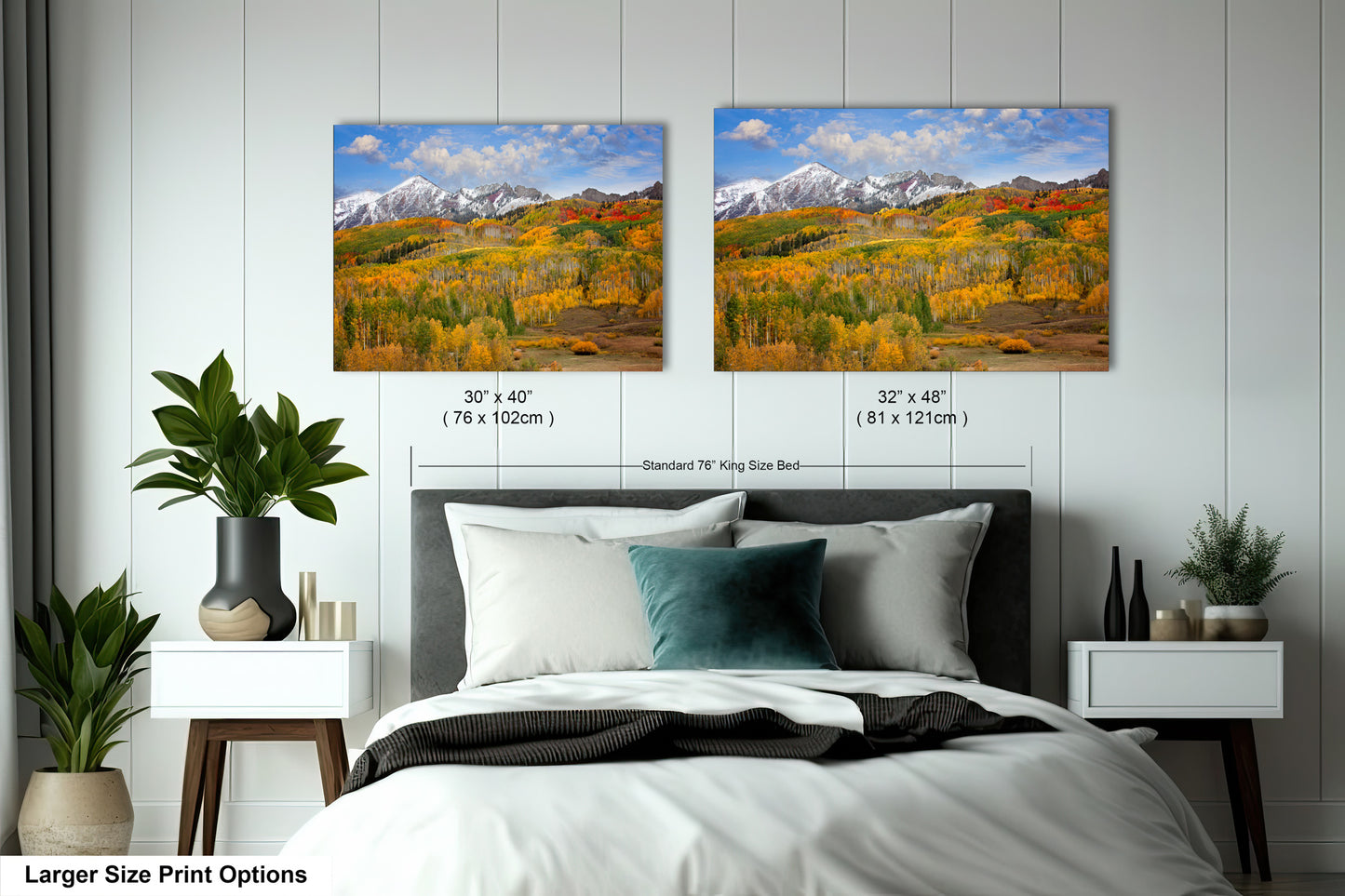 a bedroom with a bed and two pictures on the wall