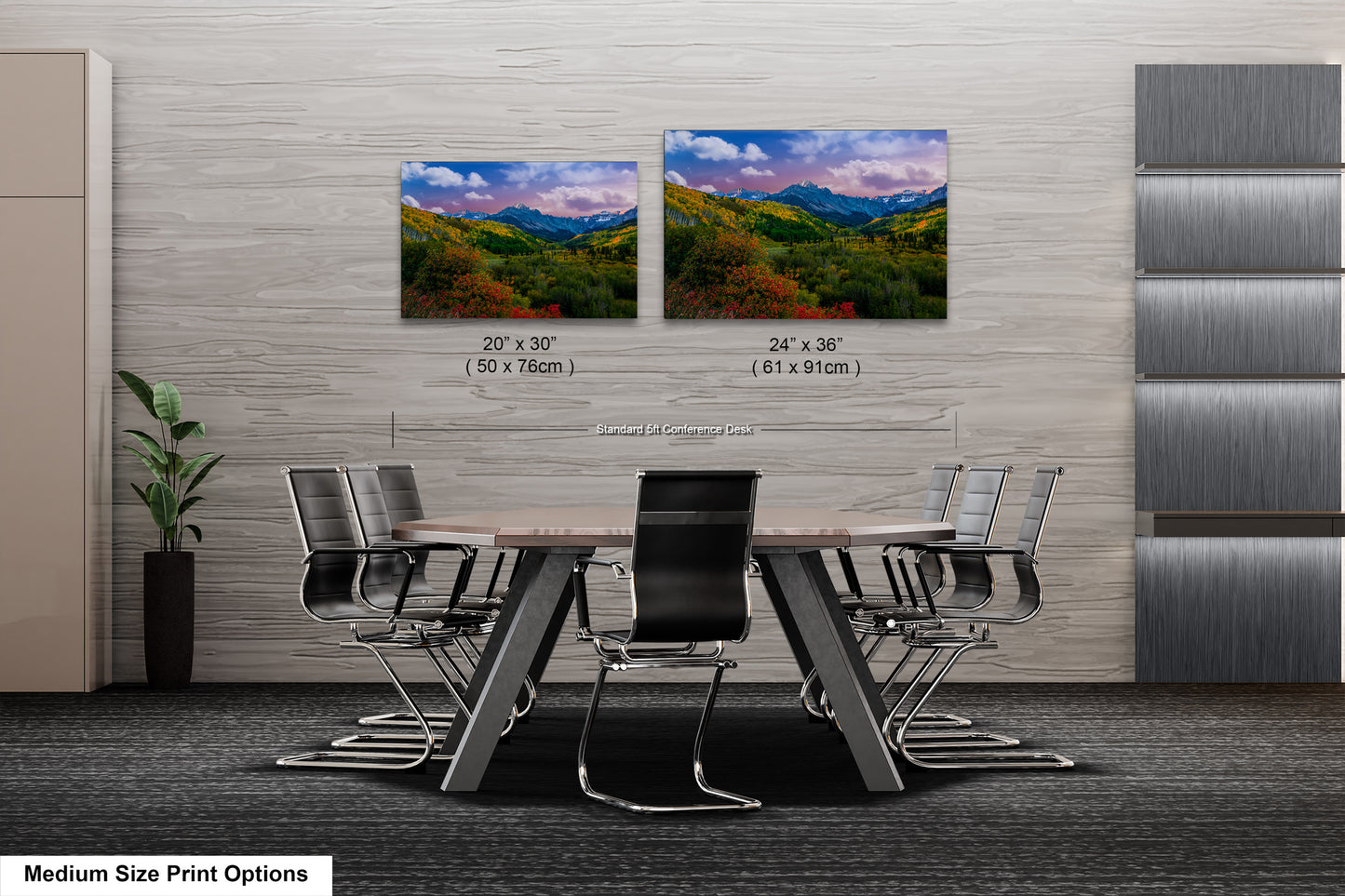 a dining room table with chairs and a wall hanging