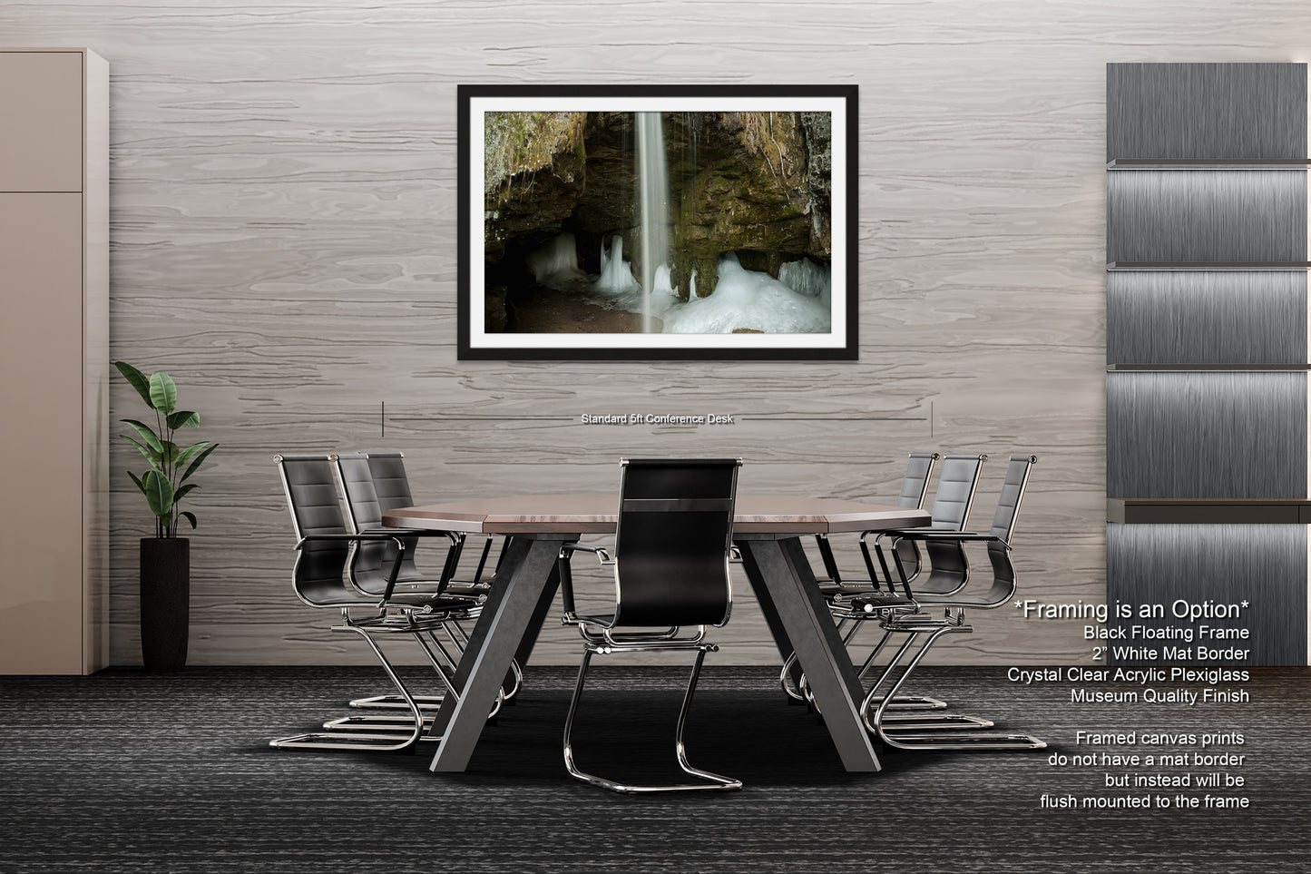 a dining room table with chairs and a picture hanging on the wall