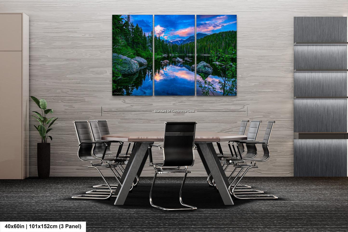 a dining room table with chairs and a painting on the wall