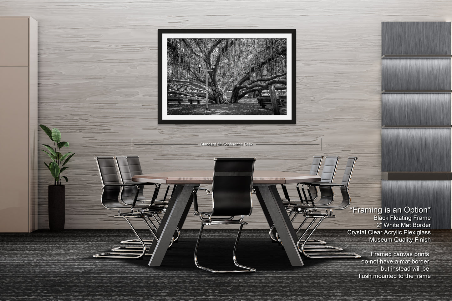 a black and white photo of a table and chairs