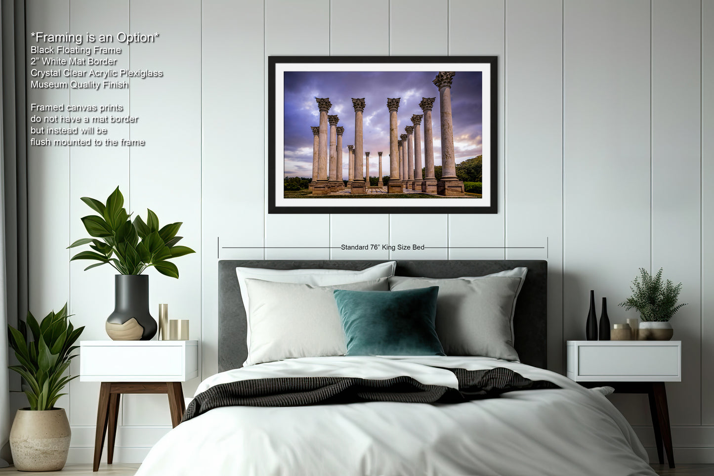 a bedroom with a bed and a picture hanging on the wall