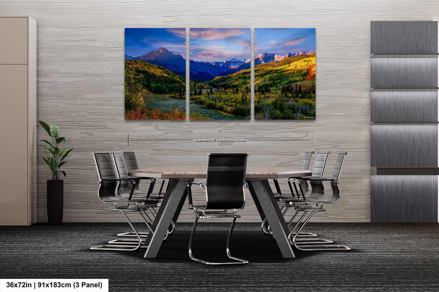 a dining room table with chairs and a painting on the wall