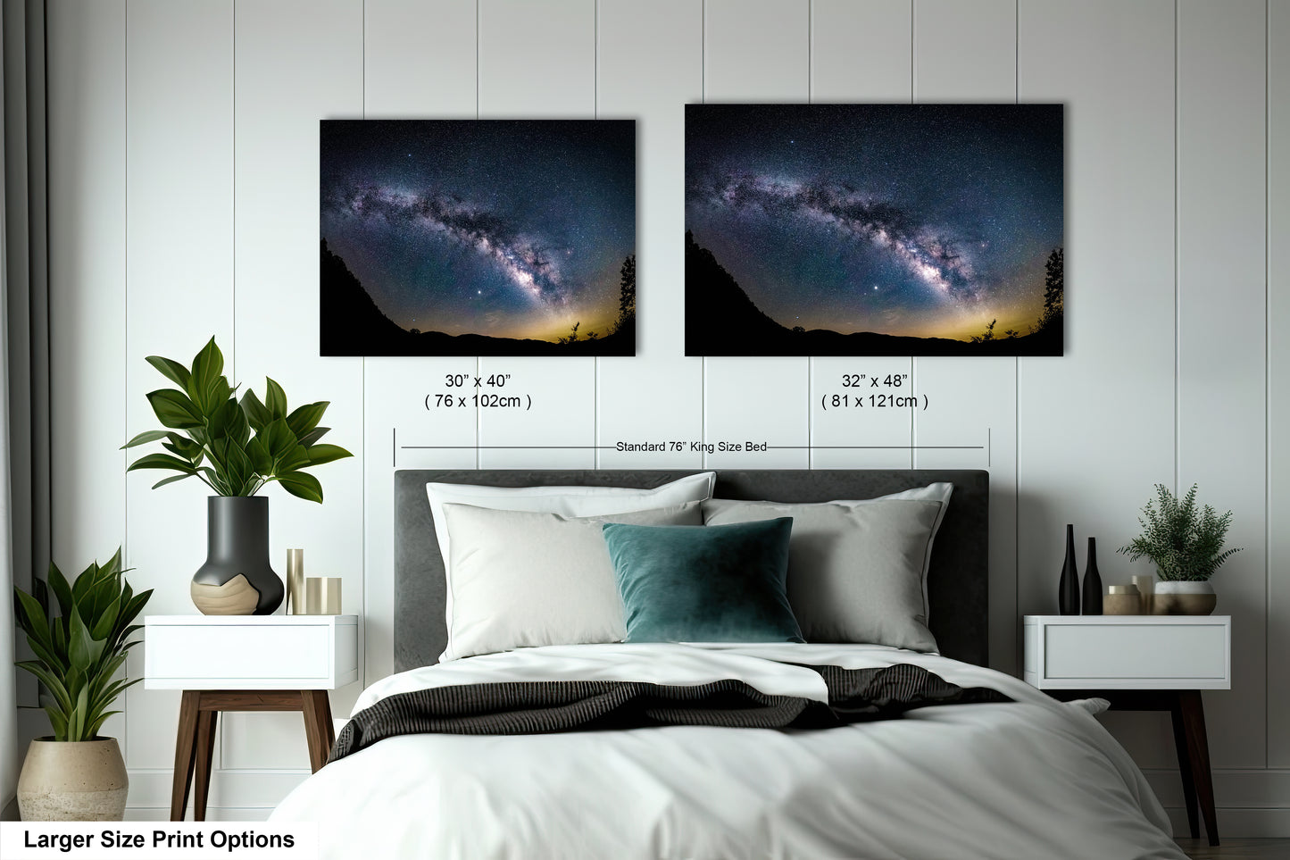 a bedroom with a bed and two pictures of the night sky