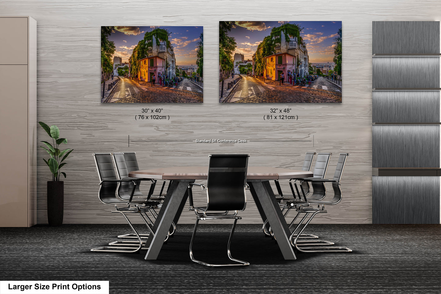 a dining room table with chairs and two pictures on the wall