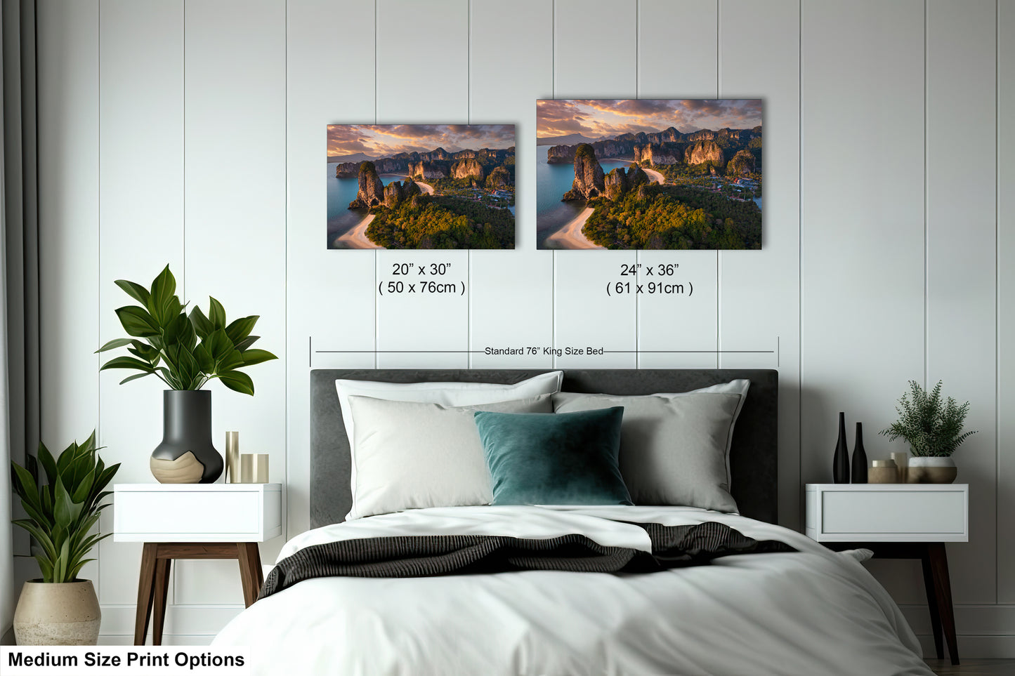 a bed with two pictures on the wall above it